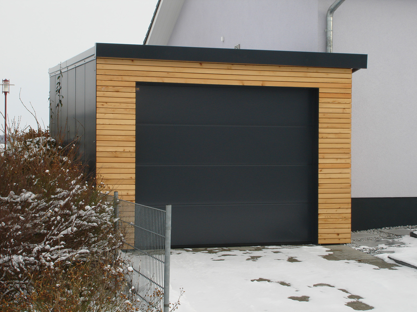 04Carport u. Garage für Strassberger