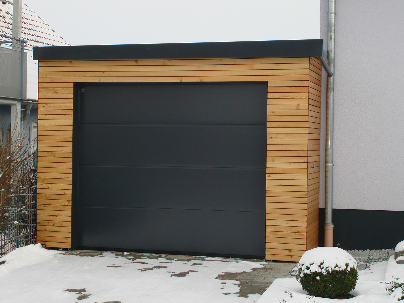 05Carport u. Garage für Strassberger